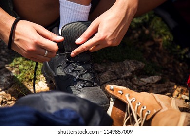 Close Up Woman Tying Hiking Boots