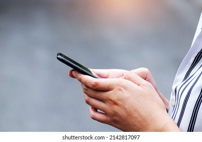 Close up woman use hands typing mobile smartphone and touch screen with app devices vintage lifestyle and communication concept modern technology 6G - Powered by Shutterstock