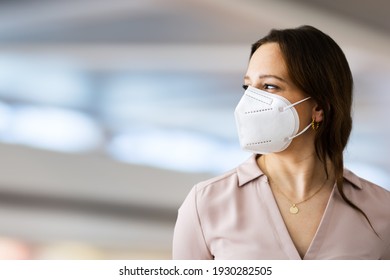 Close Up Of Woman Wearing N95 Medical Face Mask