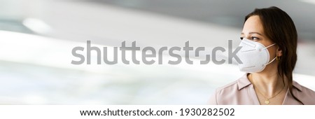 Close Up Of Woman Wearing N95 Medical Face Mask