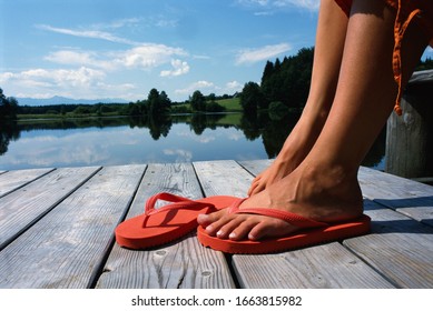 Close Up Of Woman's Feet In Sandals