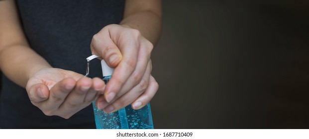 Close up woman's hand pressing alcohol gel from bottle, apply sanitizer gel for hand wash to make clean and clear germ, bacteria, and virus. Pandemic protection and Hygienic concept, selective focus - Powered by Shutterstock