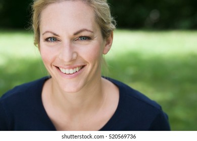 Close up of womans smiling face