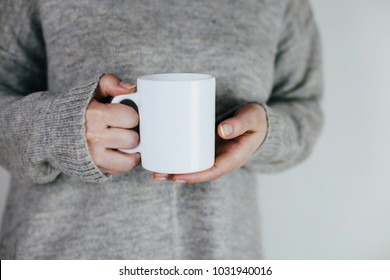 Close Up Of Women's Hands Holding White Mug With Blank Copy Space Scree For Your Advertising Text Message Or Promotional Content, Sweet Coffee Or Tea.