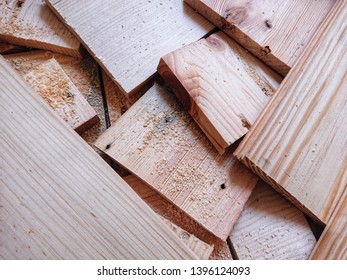 Close up of wooden cutting by electric jig saw with sawdust