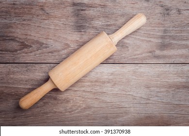 Close Up Wooden Rolling Pin On Wooden Table Top View