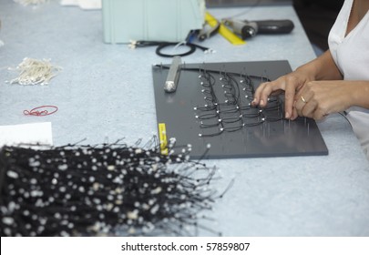 Close Up Of Worker Hands In Electrical Cable Production For Micro Electro Mechanical Systems