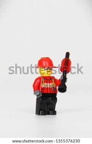Close up of Worker Toy with Red Helmet