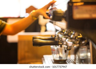 Close Up Of Worker Using Coffee Machine To Make Coffee In Resturant 