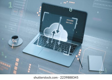 Close up of workplace desktop with laptop computer, coffee cup, notepad and digital cloud computing hologram on blurry background. Cloud data, server, service and hosting concept. Double exposure