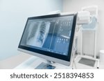 Close up of x-ray image of human chest lungs shown on the monitor screen modern laboratory equipment computer. Fluorography roentgenography medicine and health concept.