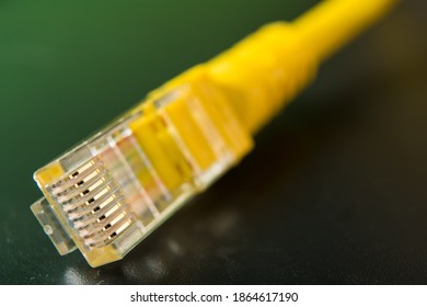 Close up of a yellow ethernet plug