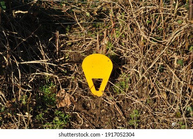 Close Up Of Yellow Plastic Boundary Marker