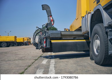 Close Up Of Yellow Truck Standing Near Drawn Markup, Detailed Photo Of Technic