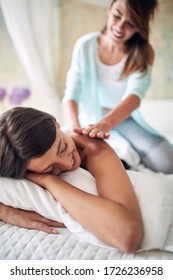 Close Up Of Young Adult Female Doing Massage To Another Woman. Relationship, Friends, Love, Seduction, Lesbian, Concept