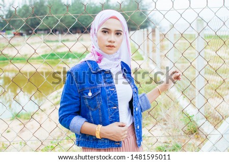 Close up young arabian muslim woman in hijab. People religious lifestyle concept. Mock up copy space
