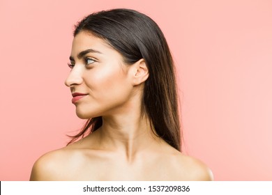 Close Up Of A Young Beauty And Natural Arab Woman Looking By Side Posing