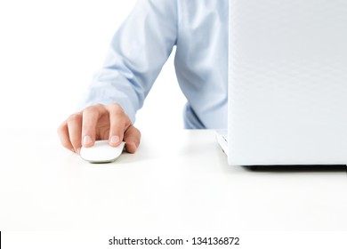 Close up of young businessman working on a laptop isolated on white background
