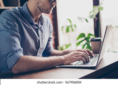 Close Up Of Young Busy Man Writing New Book On Laptop.