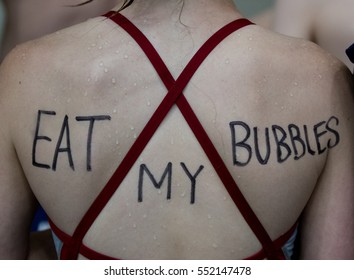 Close Up Of Young Female Swimmer's Back From Behind