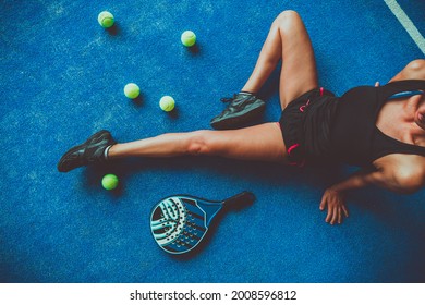 Close up young girl player and padel or tennis objects - Powered by Shutterstock