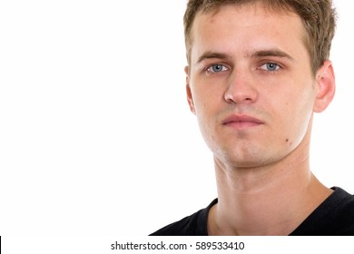 Close up of young man looking at camera