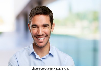Close up of a young man smiling - Shutterstock ID 318357737