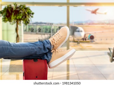 Close Up Of Young Man Waiting For The Plane At An Airport