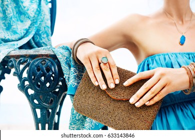 Close Up Of Young Woman Hands Holding Purse