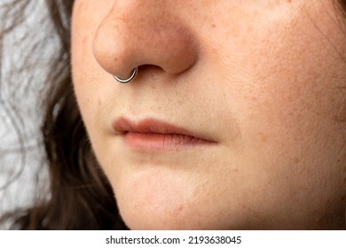 Close Up Of Young Woman With Nose Ring.