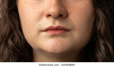 Close Up Of Young Woman With Nose Ring.