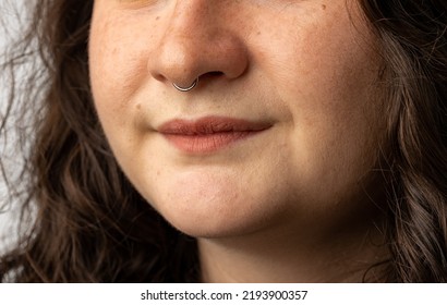 Close Up Of Young Woman With Nose Ring.