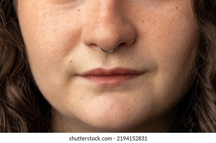 Close Up Of Young Woman With Nose Ring.