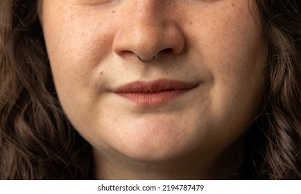 Close Up Of Young Woman Turning Up Her Nose