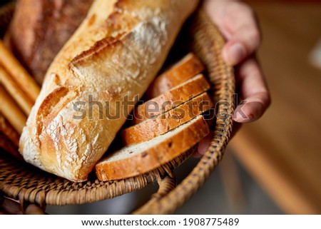 Similar – Image, Stock Photo bread in snack shop and person working