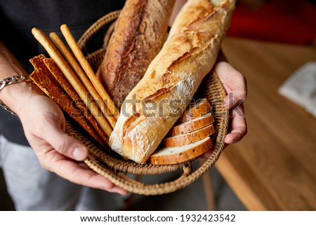 Similar – Image, Stock Photo loaf of bread Bread Eating