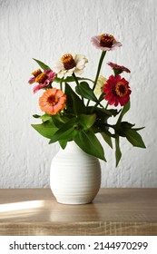 Close Up Of Zinnia Flowers In Vase 