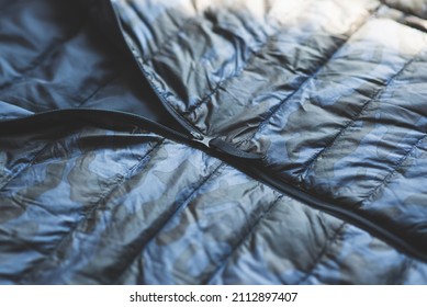 Close Up Of Zip On Blue Camouflage  Down Jacket