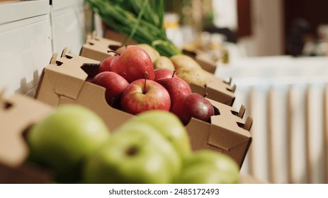 Close up zoom out shot of organic fruits and vegetables on farmers market shelves. Freshly harvested chemicals free food items in environmentally friendly zero waste supermarket - Powered by Shutterstock