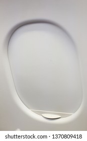 Closed airplane window. 