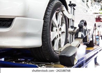 Closed Up Of An Auto Wheel That Is Undergoing Wheel Alignment