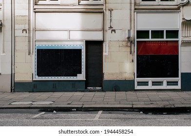 Closed Barber Shop, Closed And Locked  Store Front, Impact Of The Coronavirus Pandemic 2021.