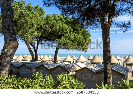 Closed beach huts during low season in February on the famous Lido beach in Venice, Italy. Travel to the Venice Carnival, visiting famous places.