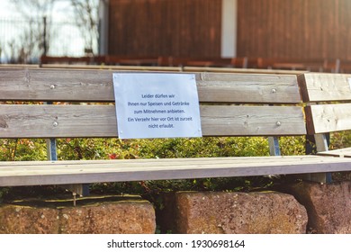 Closed Beer Garden Of Restaurant In Germany With Restriction Sign, Closed Due To Covid 19 Or Corona, Food To Take Away. Horizontal