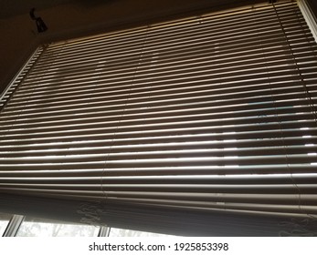 Closed blinds shadow is daunting