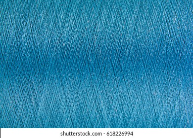 Closed up of blue color thread texture background