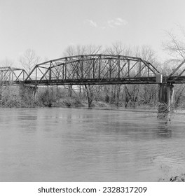 A closed bridge over the river (shot on medium format film.)