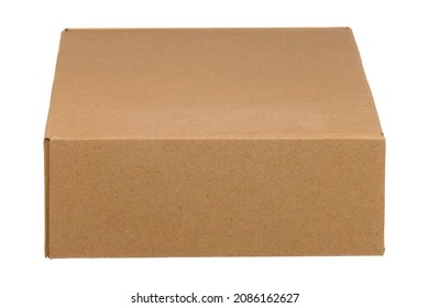 Closed Cardboard Box On A White Insulated Background. Front View At An Angle From Above. Blank For The Courier