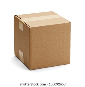Closed cardboard box taped up and isolated on a white background.