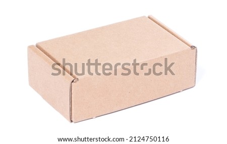 Closed cardboard small box isolated on white background